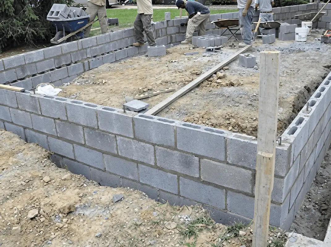 Professionals building a foundation with blocks in Phoenix, AZ