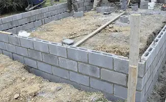 Professionals building a foundation with blocks in Phoenix, AZ