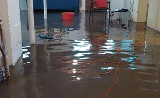 Basement with boiler, cabinets and washing machine completely flooded in Phoenix, AZ
